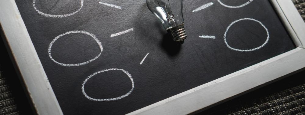 Brainstorming text on black and white board